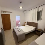 Spacious layout and natural light in our affordable three-person accommodation on the Albanian Riviera.