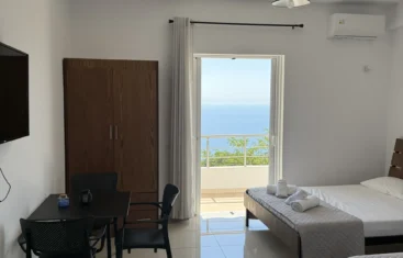 Home 1 Comfortable double and single bed in our bright sea view triple accommodation on the Albanian Riviera.