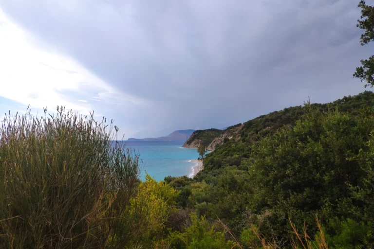 Lukova Beach 2 Elevated scenic view of the turquoise water and lush green coastline at beautiful Lumra Beach in Albania.